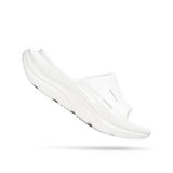 Unisex Hoka Ora Recovery Slide 3 shoes in white with cushioned straps and textured sole for comfortable recovery footwear.