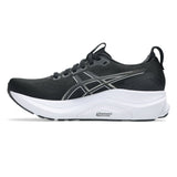 Women's ASICS GEL-Kayano 32 stability trainers in black and white with supportive cushioning and sporty design.