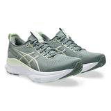Women’s ASICS GEL-Kayano 32 stability trainers in monument blue and whisper green, featuring supportive design and cushioned soles.