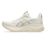 Womens ASICS GEL-Kayano 32 stability trainers in oatmeal and meteor grey color, featuring supportive design and cushioned soles.