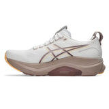 Womens ASICS GEL-Kayano 32 stability trainers in white and orange glow with cushioned design and supportive sole.
