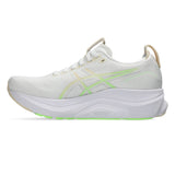 Women’s ASICS GEL-Kayano 32 stability trainers in white and seashell color, with cushioned soles and supportive design.