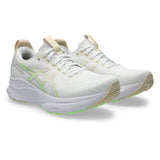 Women's ASICS GEL-Kayano 32 stability trainers in white and seashell color, featuring supportive design and cushioned soles.