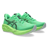 Women's ASICS Novablast 5 neutral daily trainers in Vital Green and black with a breathable mesh upper and cushioned sole.