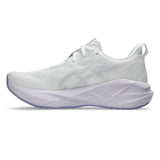 Women's ASICS Novablast 5 Wide neutral daily trainers in white and lilac, featuring breathable mesh and cushioned sole.