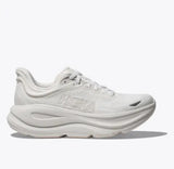 Women's Hoka Bondi 9 running shoes in white, B-width, featuring cushioned sole and supportive design for comfortable running.