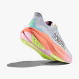 Women's Hoka Mach 6 B-width running shoes in dusk illusion color, featuring breathable mesh and cushioned sole for comfort.
