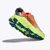 Women's Hoka Speedgoat 7 shoes in persimmon neon yuzu color, featuring B-width for a comfortable fit and trail running performance.