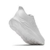 Women's Hoka Clifton 11 shoes in white, showing the side view with B-width fit, designed for comfort and lightweight running.