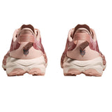 Women's Hoka Speedgoat 6 running shoes in rose latte color, showing the back view with B-width fit and supportive design.