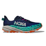 Women's Hoka Speedgoat 6 shoes in varsity blue, B-width, featuring a lightweight trail running design and supportive outsole.