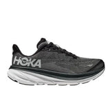 Youth Hoka Clifton 9 shoes in black and white with breathable mesh upper and cushioned sole, designed for comfort and style.