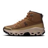 Women's On Cloudrock Mid Waterproof hiking boots, showcasing sturdy design and waterproof features for outdoor adventures.