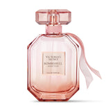 Victoria's Secret Bombshell Seduction perfume bottle with sleek design and floral accents, showcasing the luxurious fragrance packaging.