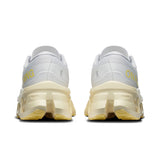 On Cloudmonster 3 women's road running shoes with breathable mesh upper and cushioned sole, designed for comfort and performance.