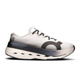 Men's On Cloudboom Max road running shoes with sleek black and white design, featuring cushioned soles and breathable mesh upper.
