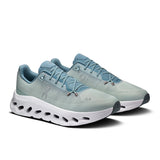 Men's On Cloudtilt active life sneakers in black with white sole, showcasing the sleek design and breathable upper material.