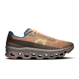 On Cloudmonster Void men's limited edition running shoes in ivory and dust color, featuring lightweight active life design and cloud cushioning.