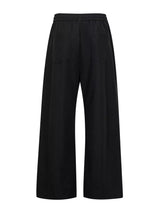 Men's wide-leg drawstring pants by Trendsi, featuring a relaxed fit and casual style, shown in a neutral color.