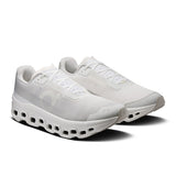 Men's On Cloudmonster Void active life shoes with black and gray design, featuring cloud cushioning and sporty athletic style.