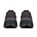 Men's On Cloudmonster Void active life sneaker, showing the lightweight design and stylish black and gray colorway.