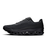 Men's On Cloudmonster Void active life sneakers with black and gray design, featuring cushioned soles and breathable mesh uppers.