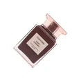 Tom Ford Lost Cherry perfume bottle with elegant design and dark red accents, showcasing the luxurious fragrance.