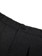 Men's high-waisted pleated wide-leg Capri pants by Trendsi, showing the relaxed fit and stylish design in natural fabric.