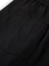 Men's wide-leg drawstring pants by Trendsi, showing relaxed fit with adjustable waistband and lightweight fabric.