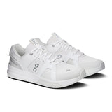 On THE ROGER Clubhouse Pro 2 men's tennis shoes with white and blue design, featuring cushioned soles and athletic fit.