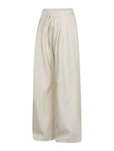 Men's wide-leg drawstring pants from Trendsi, featuring a relaxed fit and casual style in neutral fabric.