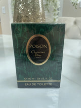 Christian Dior Poison women's Eau de Toilette spray in 3.4 fl oz bottle, elegant fragrance with floral and oriental notes.