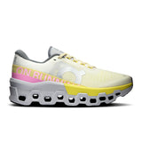 Women's On Cloudmonster 2 road running shoes in ivory and lime with limited edition design, featuring cushioned sole and breathable upper.