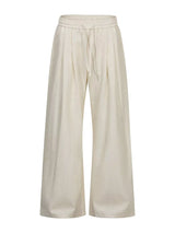 Men's wide-leg drawstring pants from Trendsi, showing the relaxed fit, elastic waistband, and casual style in a neutral fabric.
