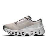 On Cloudmonster 3 women's road running shoes with breathable mesh upper and cushioned sole, designed for comfort and performance.