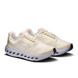 Women's On Cloudsurfer Next road running shoes in black with blue accents, featuring breathable mesh upper and cushioned sole.