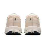 Women's On Cloudsurfer 2 road running shoes in white with blue accents, showcasing the breathable mesh upper and cushioned sole.