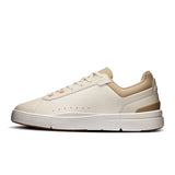 On THE ROGER Advantage women's limited edition running shoes in dew and sand colors, showcasing the sleek athletic design.