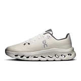 Men's On Cloudtilt active lifestyle sneakers in black and white, featuring lightweight design and cushioned soles for comfort.