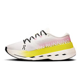 Men's On Cloudboom Max road running shoes in black with white accents, featuring lightweight cushioning and durable outsoles.
