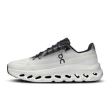 Men's On Cloudtilt active lifestyle shoes in black with white soles, showcasing the sleek, lightweight design and breathable upper.