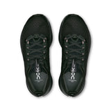 Women's On Cloudsurfer Max road running shoes in grey and pink with cushioned soles and breathable mesh uppers.