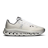 Men's On Cloudtilt active lifestyle shoes in black and gray with breathable mesh and cushioned soles for comfort and support.