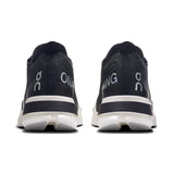 Women's On Cloudboom Strike road running shoe with sleek design, breathable mesh upper, and responsive cushioning for performance.