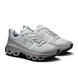 Women's On Cloudrock Low Waterproof hiking shoes with breathable mesh and waterproof features, suitable for outdoor adventures.