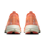 Women's On Cloudboom Strike road running shoe with supportive design and breathable mesh upper for high-performance running.