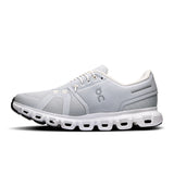 On Cloud 6 women's running shoes in black and white, featuring cushioned soles and breathable mesh upper for active life.