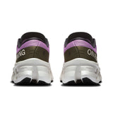 Women's On Cloudmonster 3 road running shoes in black with blue accents, featuring a cushioned midsole and breathable mesh upper.