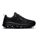 Men's On Cloudrock Low Waterproof hiking shoes with black and gray design, featuring durable outdoor-ready soles.
