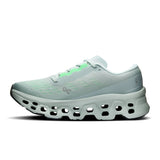 Women's On Cloudmonster 3 road running shoes with cushioned soles and breathable mesh upper, designed for comfort and performance.